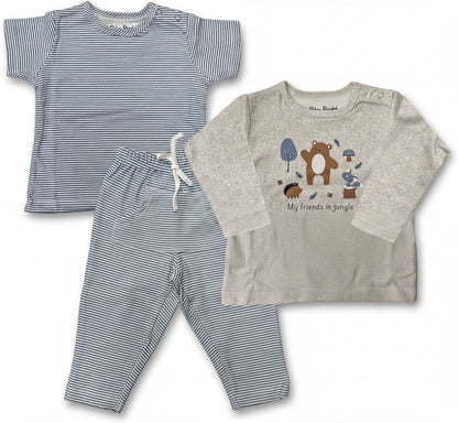 A striped shirt, a pair of striped pants, and a long-sleeved shirt with a jungle-themed design.