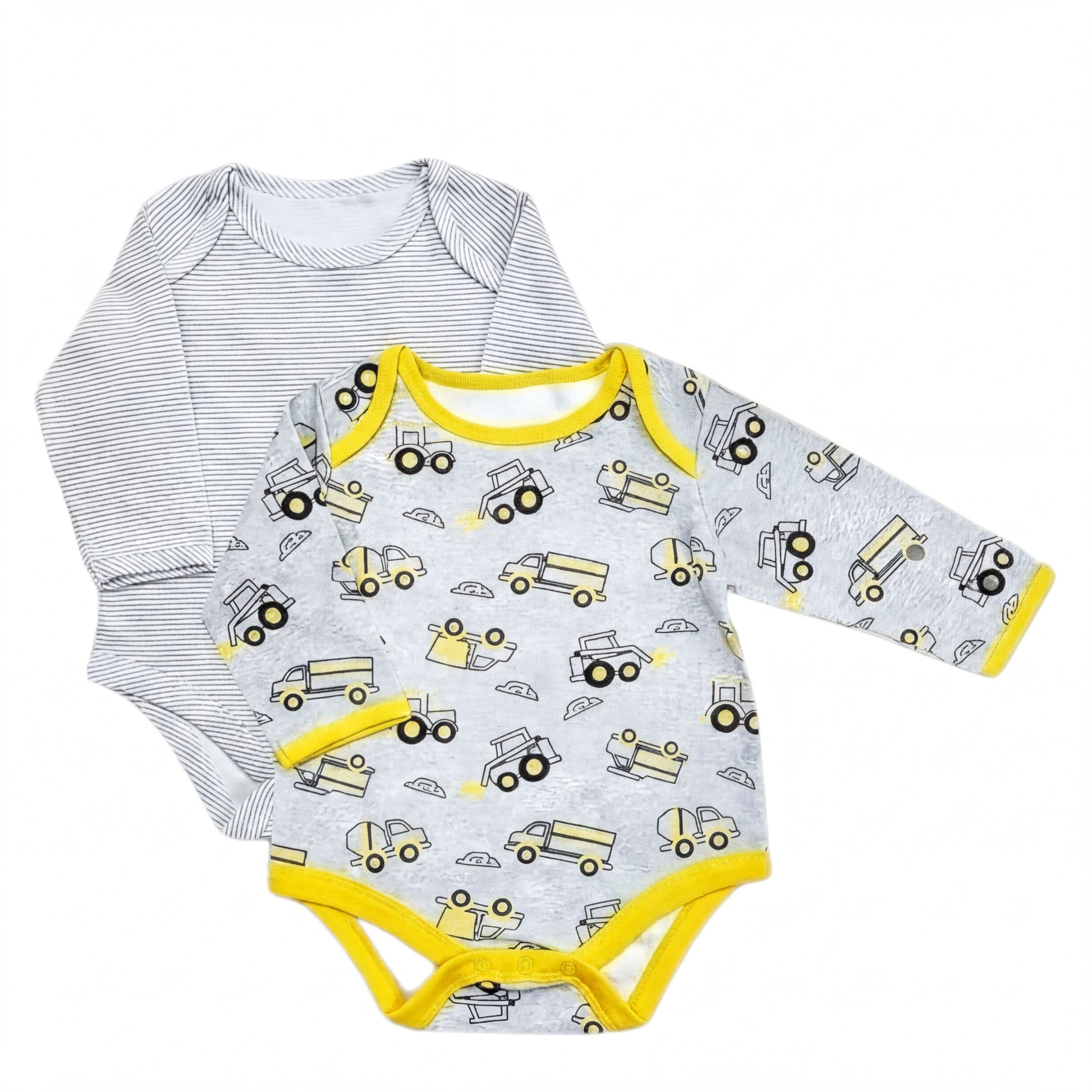 two baby onesies, one with a gray and yellow truck pattern and the other with a striped pattern.
