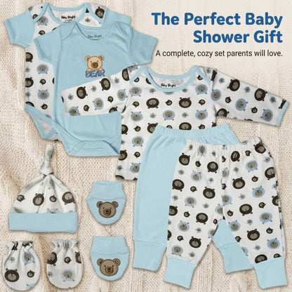 A collection of baby clothing and accessories, including onesies, pajamas, hats, and booties, arranged on a white background.