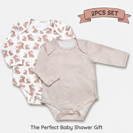 two baby onesies with a bunny pattern, arranged side by side. The onesies have long sleeves and a striped pattern. The image also includes a banner that reads "2PCS SET" and "The Perfect Baby Shower Gift".