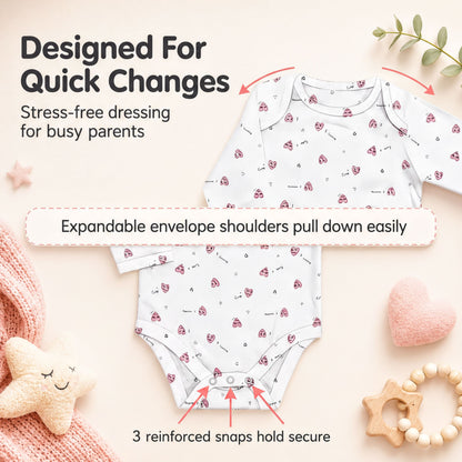 The image is a promotional graphic for a baby outfit designed for quick changes. It features a white baby onesie with a pattern of red hearts, an adjustable expandable envelope shoulder, and three reinforced snaps to hold the outfit securely.